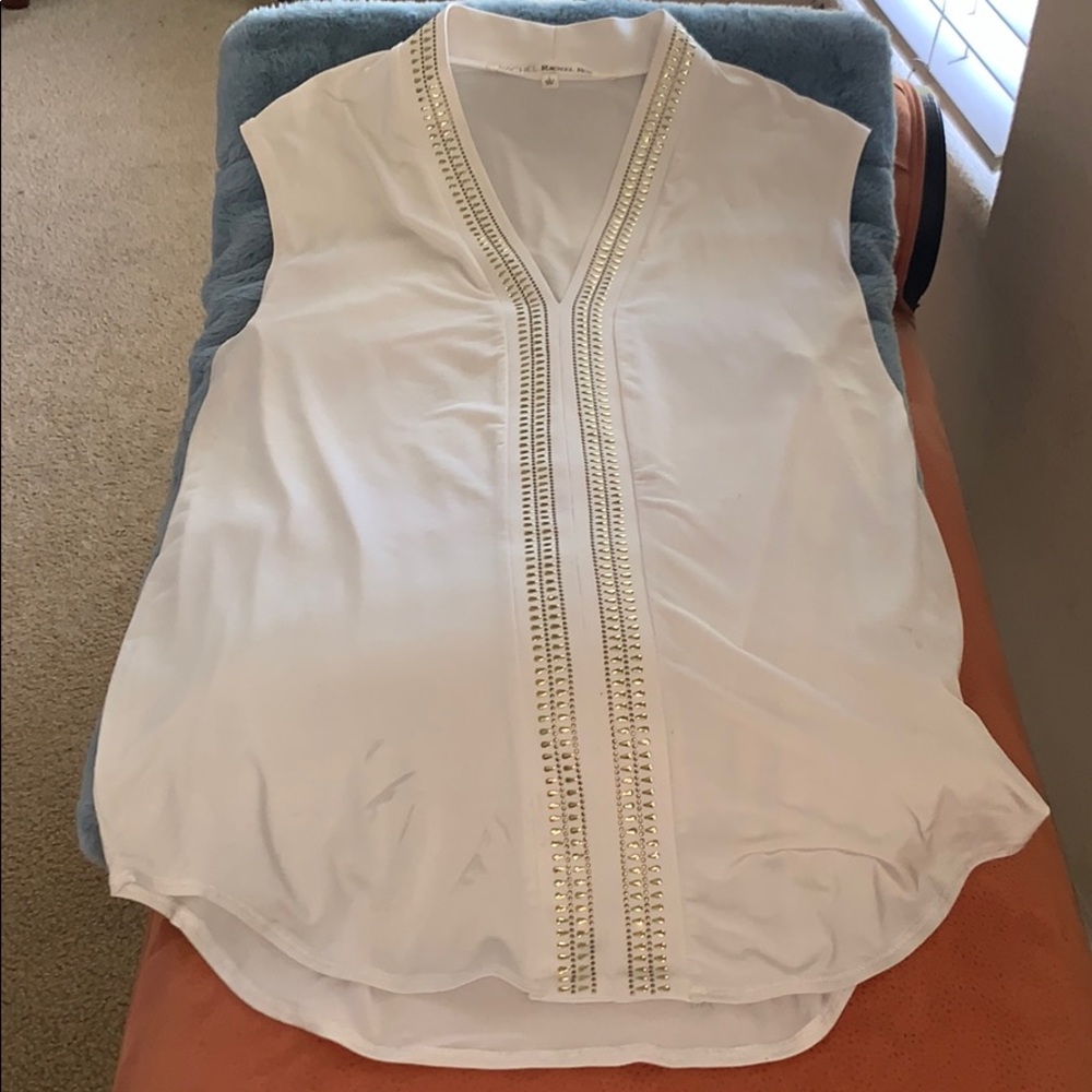 Off White top with gold embellishments.